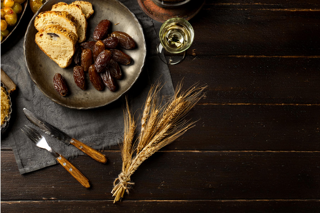 Wood Table Spread with Dates and Bread
