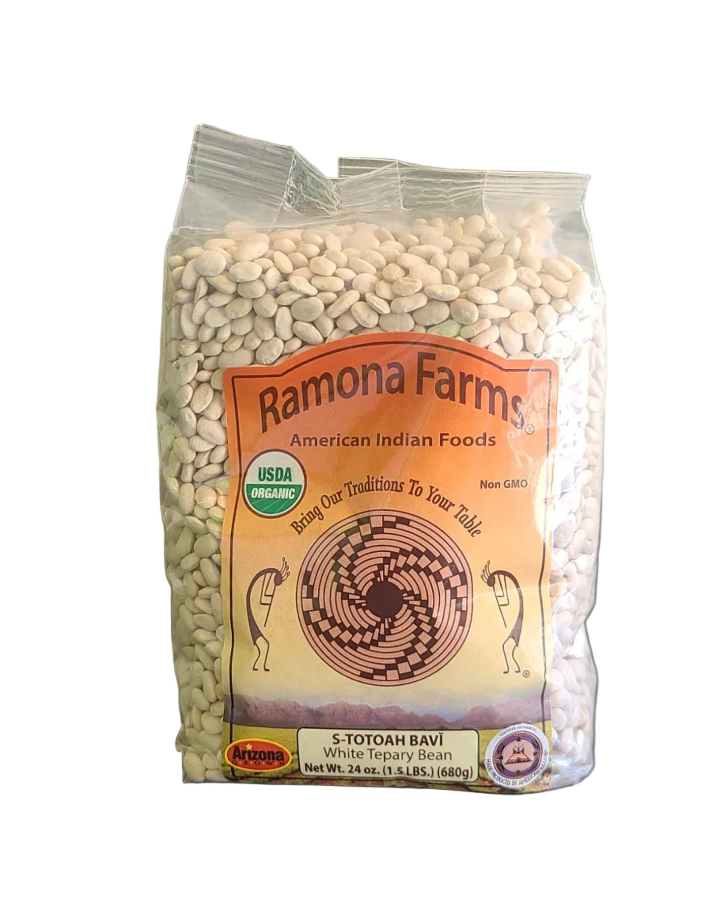 Bag of Ramona Farms organic white beans on a countertop with a plant in the background
